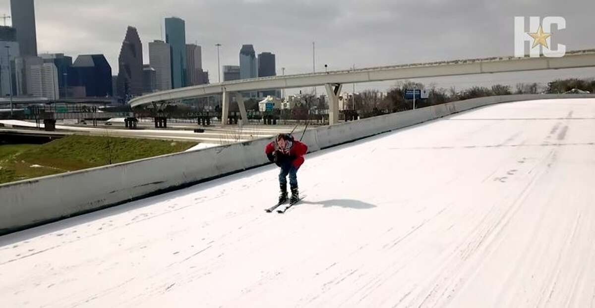 After a rare Houston snowfall, James Cody Hovland skied downtown's overpasses.