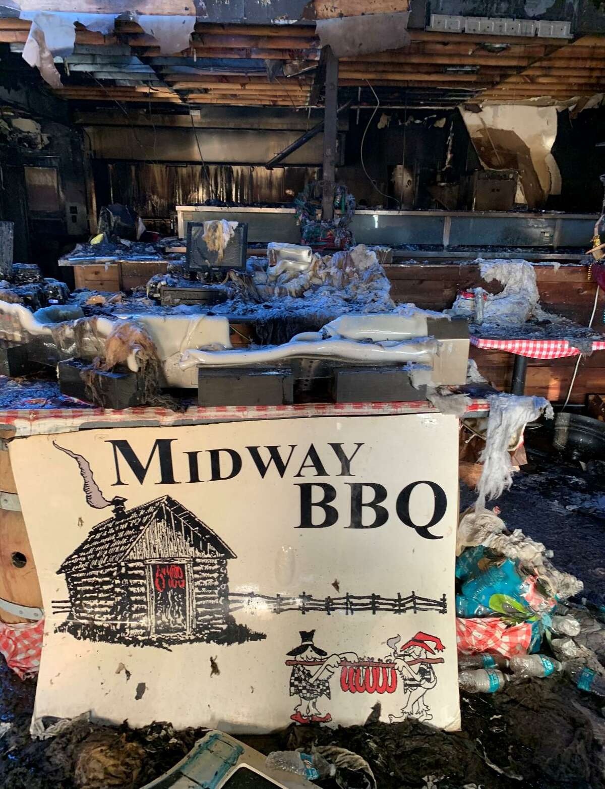 This photo shows the wreckage of popular Katy restaurant Midway BBQ, which caught fire in the early hours of Saturday, Feb. 20, 2021.