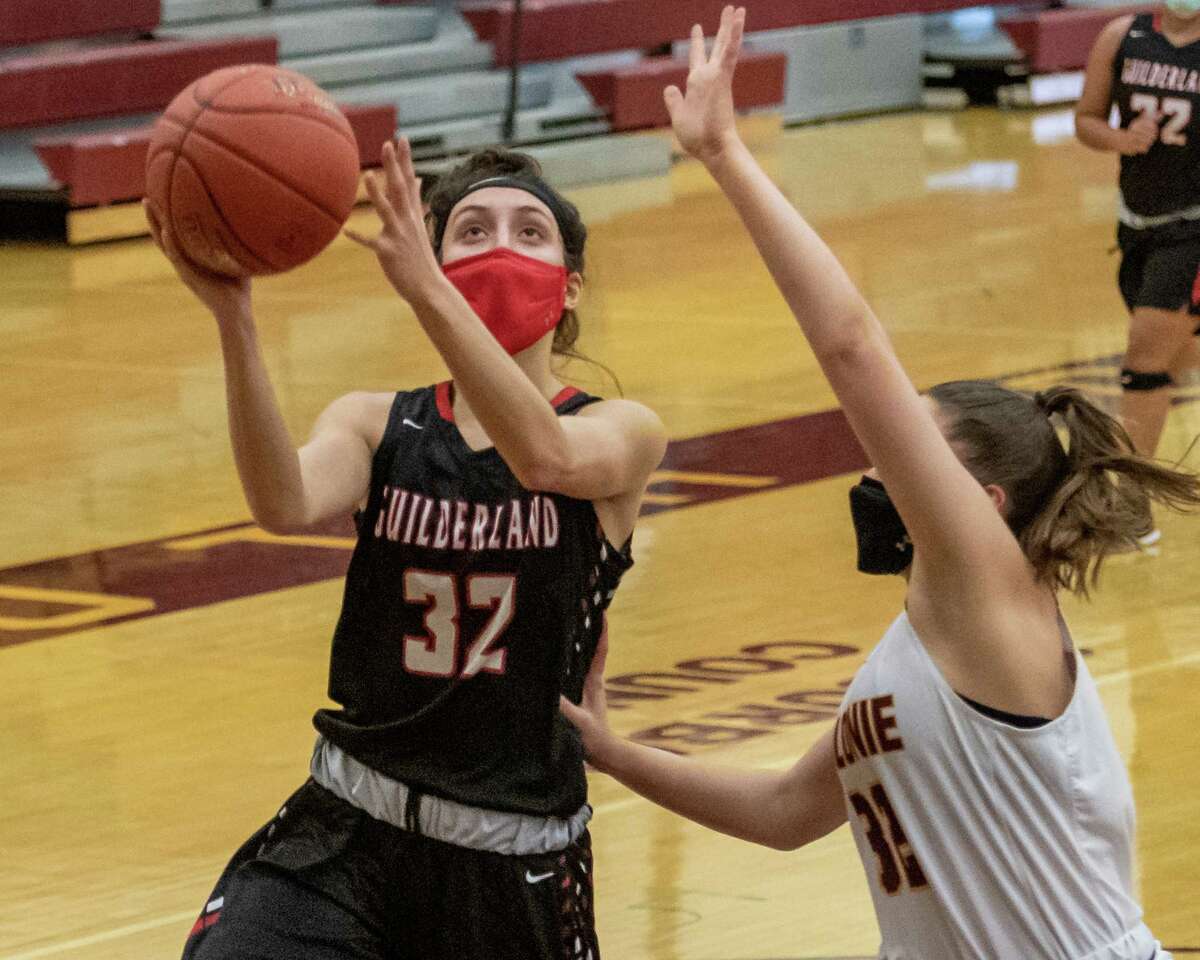 Guilderland senior Alexis Martin drives to the basket in front of Colonie defender Gabrielle Martin during a Suburban Council matchup at Colonie High School in Colonie, NY, on Saturday, Feb. 20, 2021 (Jim Franco/special to the Times Union.)
