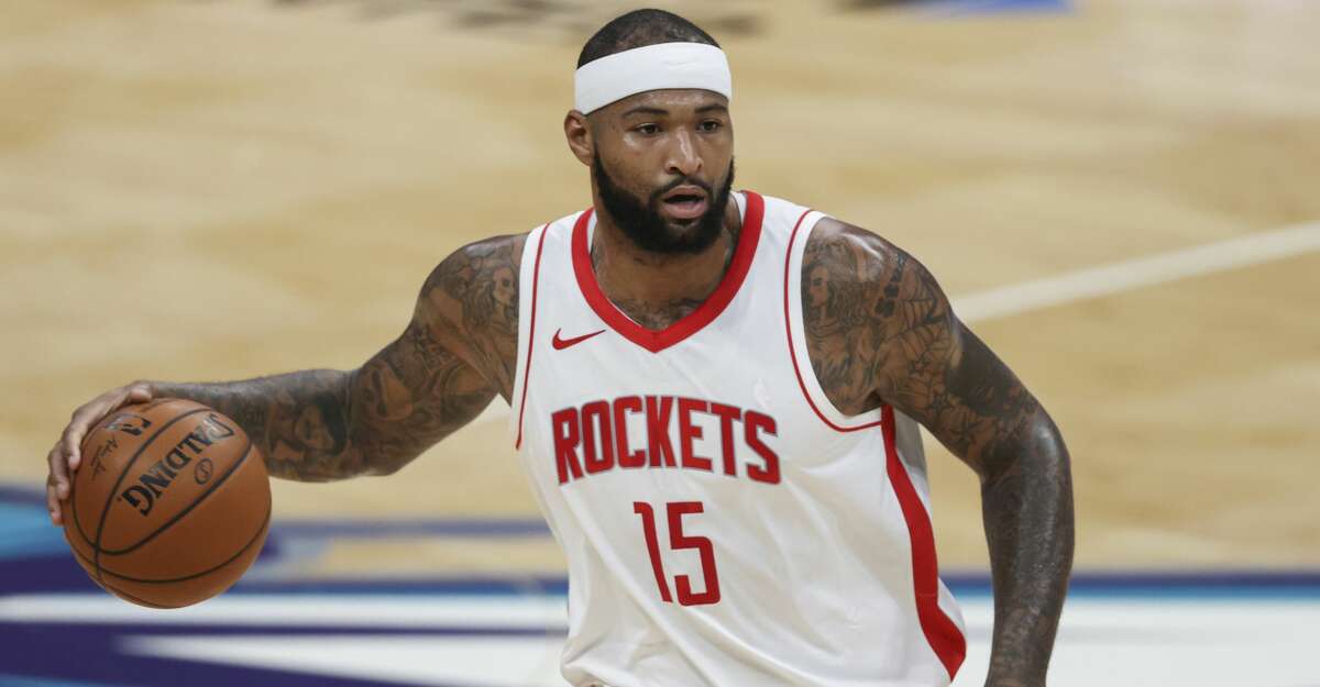 Houston Rockets center DeMarcus Cousins brings the ball up court against the Charlotte Hornets in the first half of an NBA basketball game in Charlotte, N.C., Monday, Feb. 8, 2021. (AP Photo/Nell Redmond)