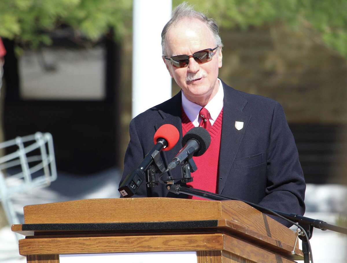 Fairfield University Assistant Vice President of Administration and Student Affairs James Fitzpatrick, Class of 1970, gives opening remarks at a 75th anniversary flag raising on March 17, 2017 in Fairfield, Conn.