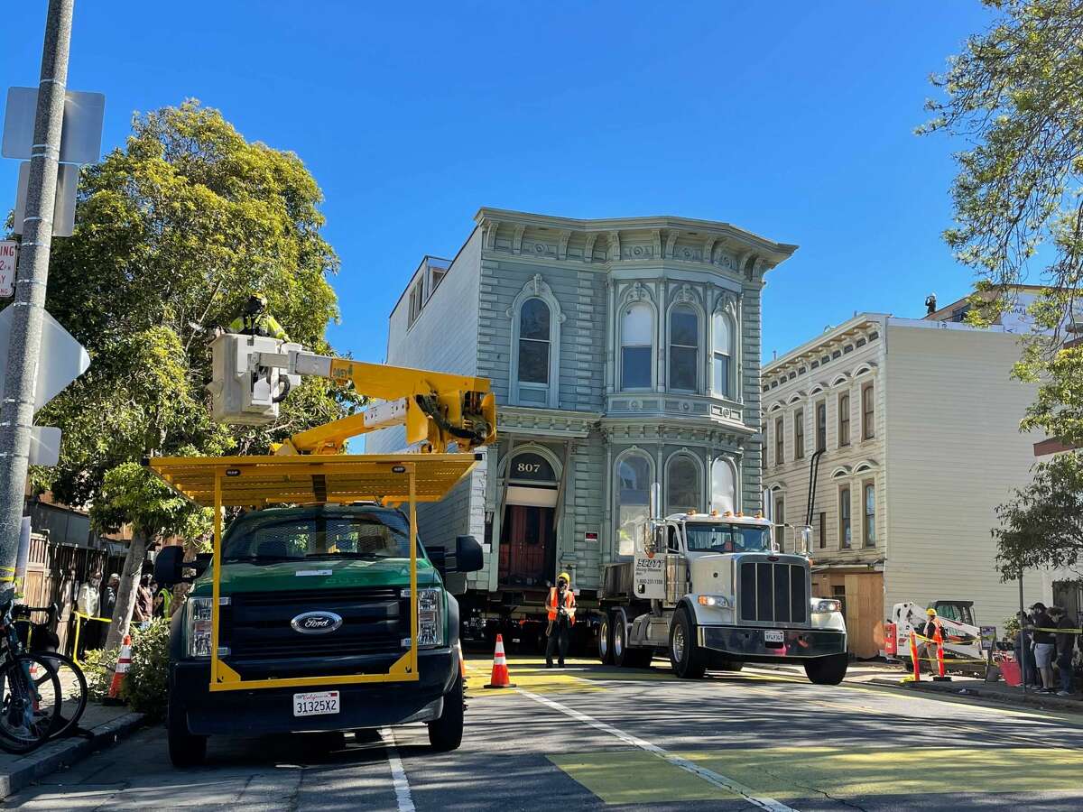 The Victorian home once located at 807 Franklin Street nears its new resting place at 635 Fulton Street in San Francisco on Feb. 21, 2021.