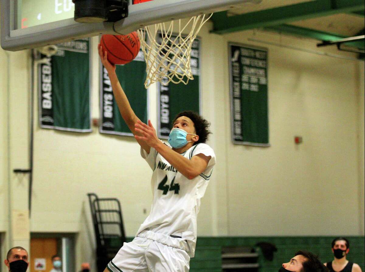 New Milford’s JoJo Wallace, son of former Knick John Wallace, hits a layup against Joel Barlow in New Milford on Feb. 13.