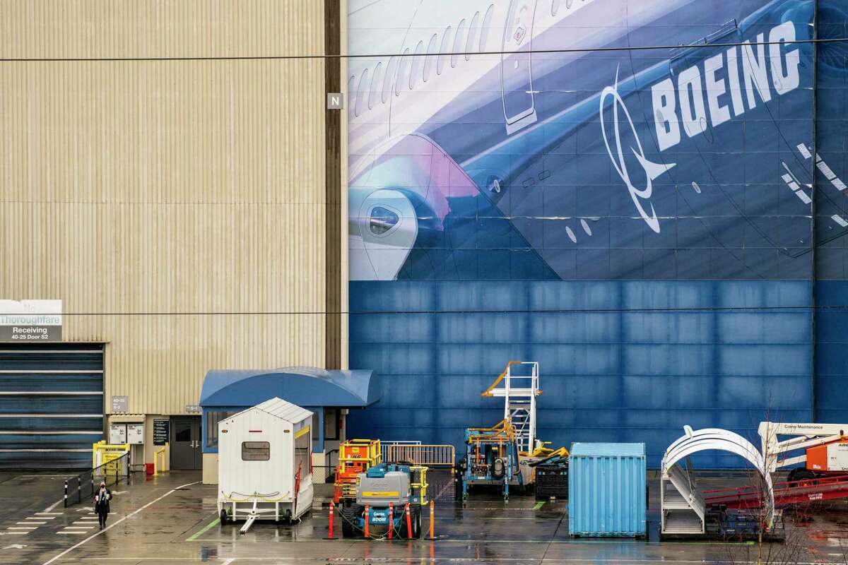 EVERETT, WA - FEBRUARY 22: A worker leaves Boeing's airplane production facility on February 22, 2021 in Everett, Washington. Following Saturday's engine failure on a Boeing 777 over Denver, the FAA issued an emergency inspection order for Boeing 777 aircraft with Pratt & Whitney engines. (Photo by David Ryder/Getty Images)
