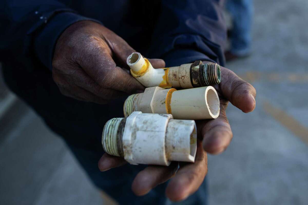 Levase Campbell of Missouri City holds plumbing parts he hopes to find for his home at Ferguson Plumbing at W. 26th Street on Feb. 22, 2021, in Houston. He waited in line for over an hour.