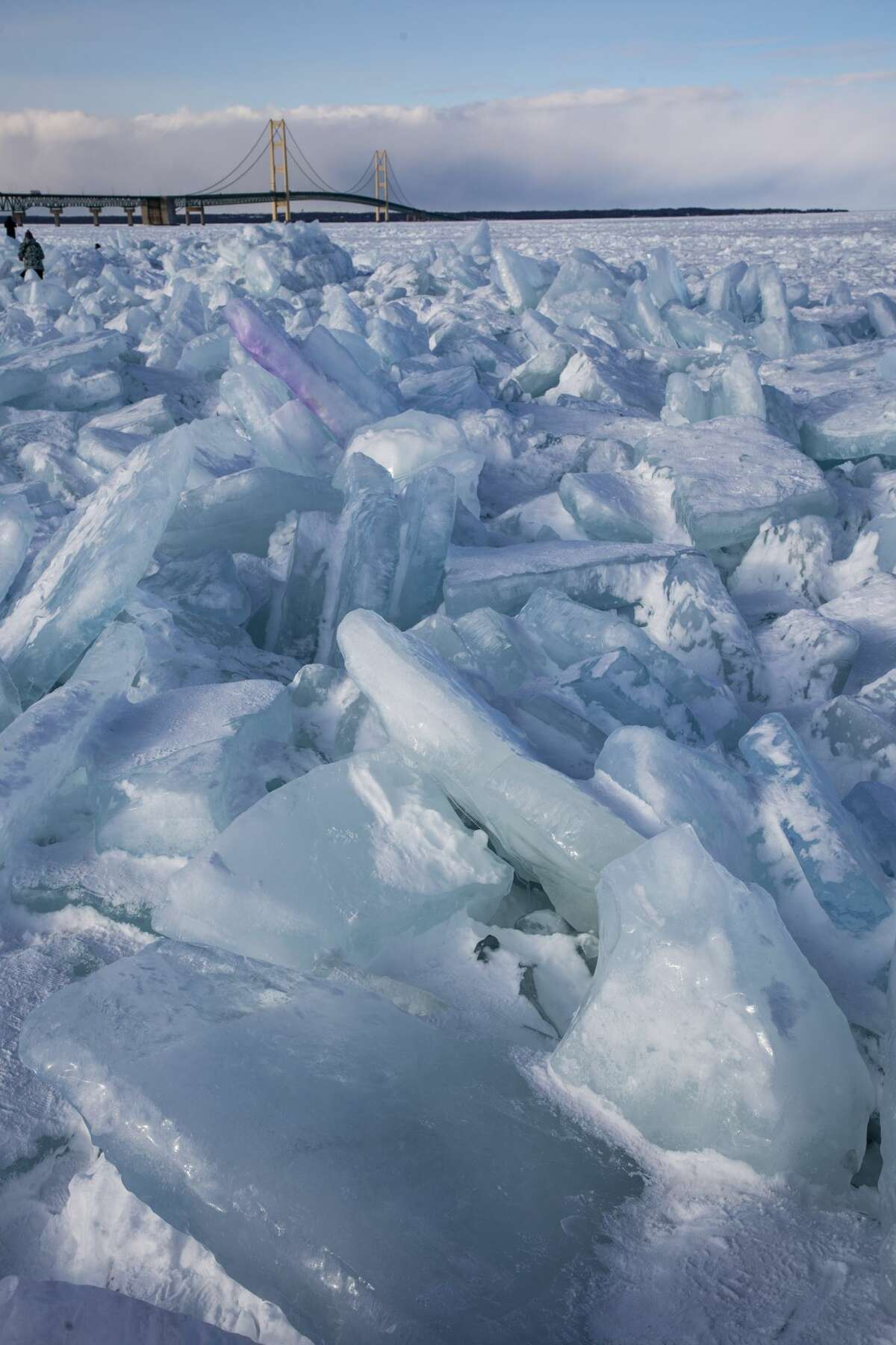 Photos Visitors explore blue ice near Mackinac Bridge Feb. 22, 2021