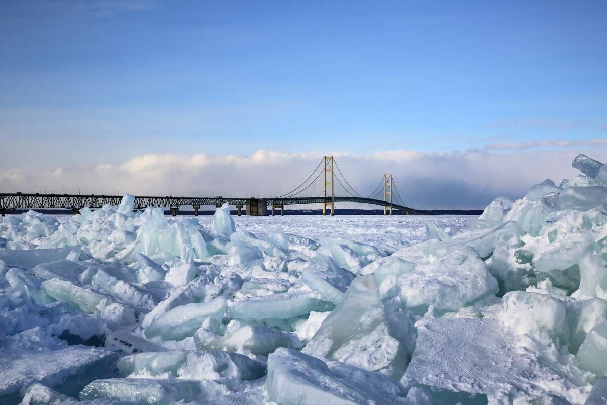 Photos Visitors explore blue ice near Mackinac Bridge Feb. 22, 2021