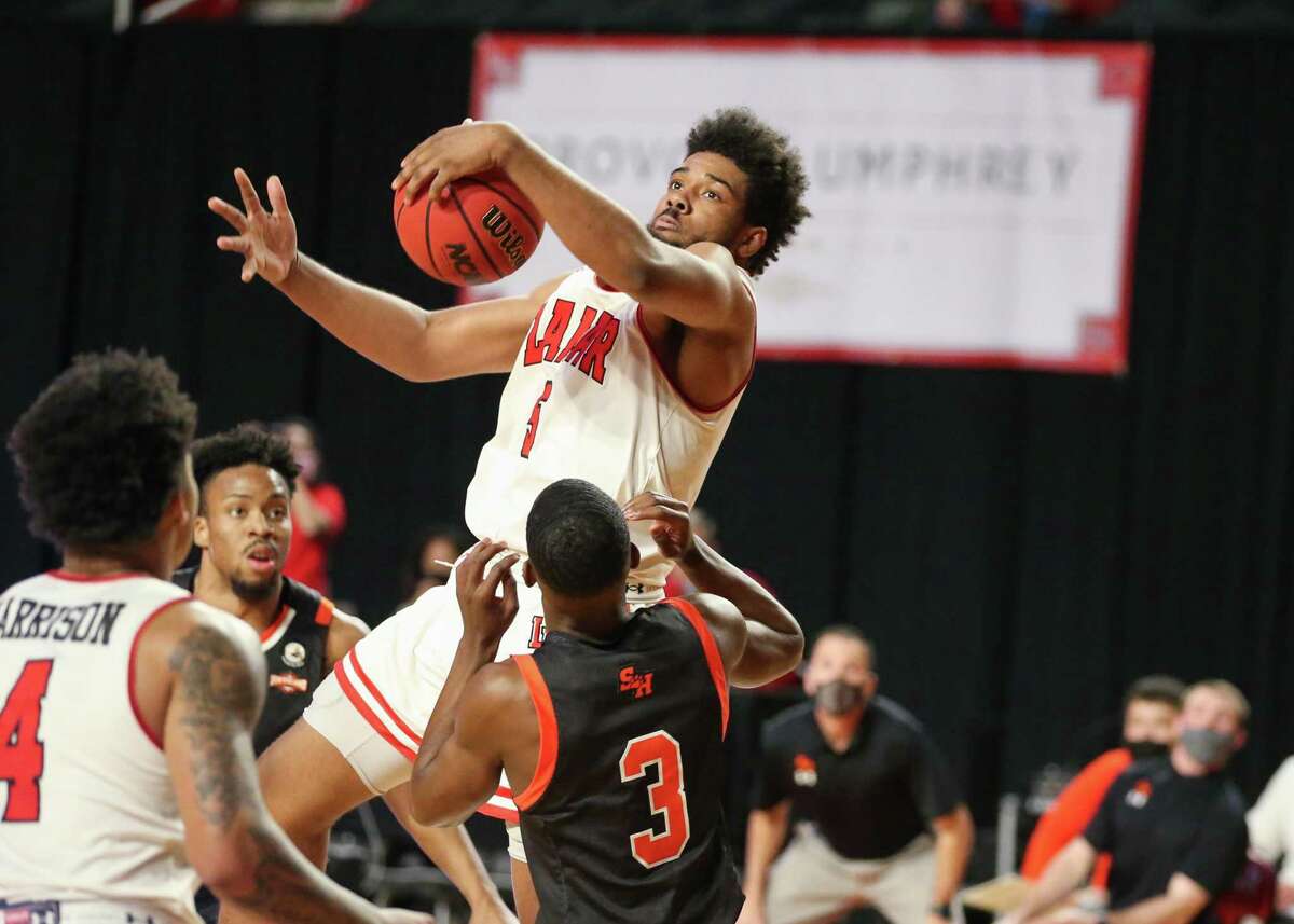Lamar senior forward Avery Sullivan grabs a rebound during the Cardinals' loss to Sam Houston Monday night at the Montagne Center.