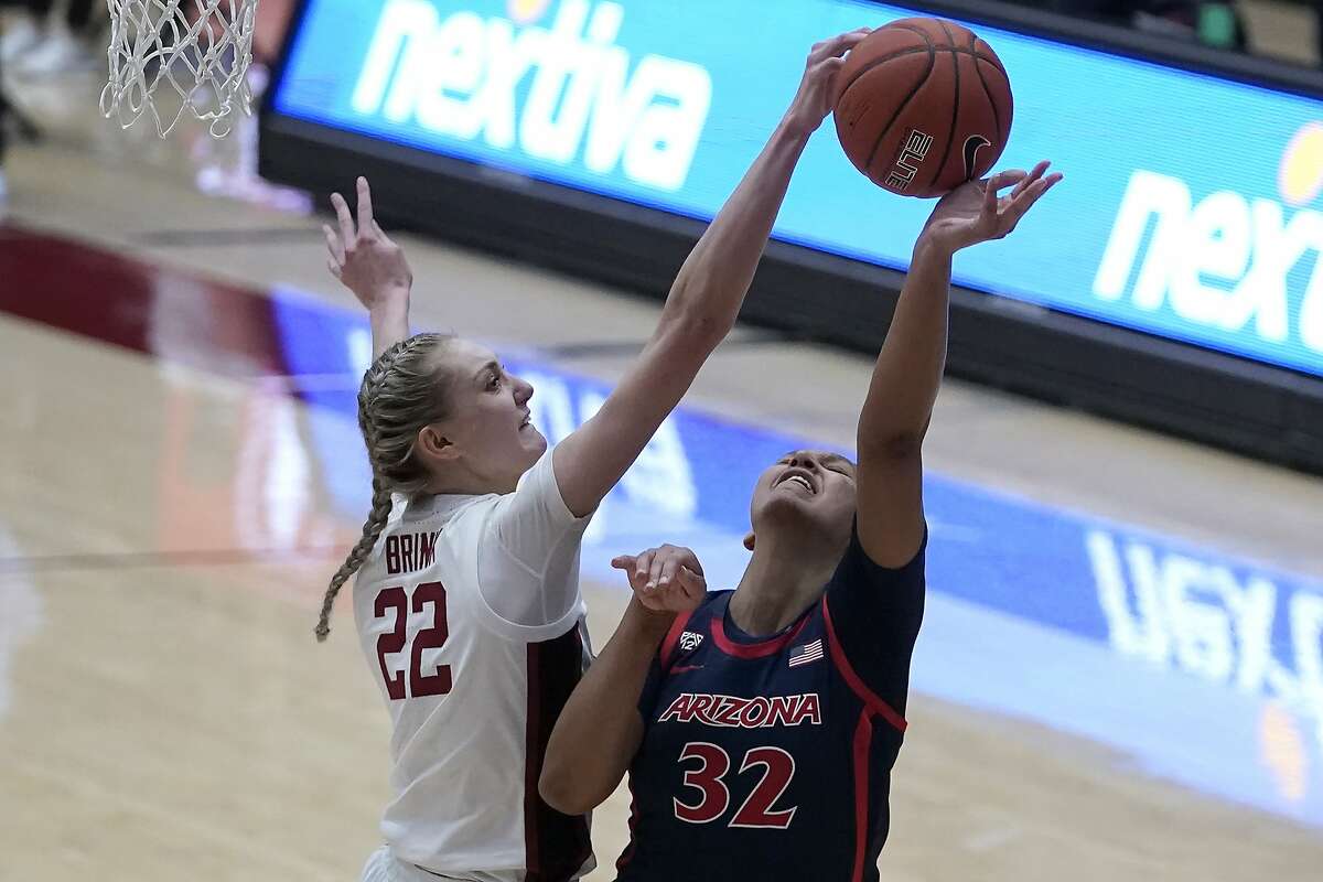 Stanford forward Cameron Brink (22) blocks a shot by Arizona forward Lauren Ware (32) during the second half of an NCAA college basketball game in Stanford, Calif., Monday, Feb. 22, 2021. (AP Photo/Jeff Chiu)