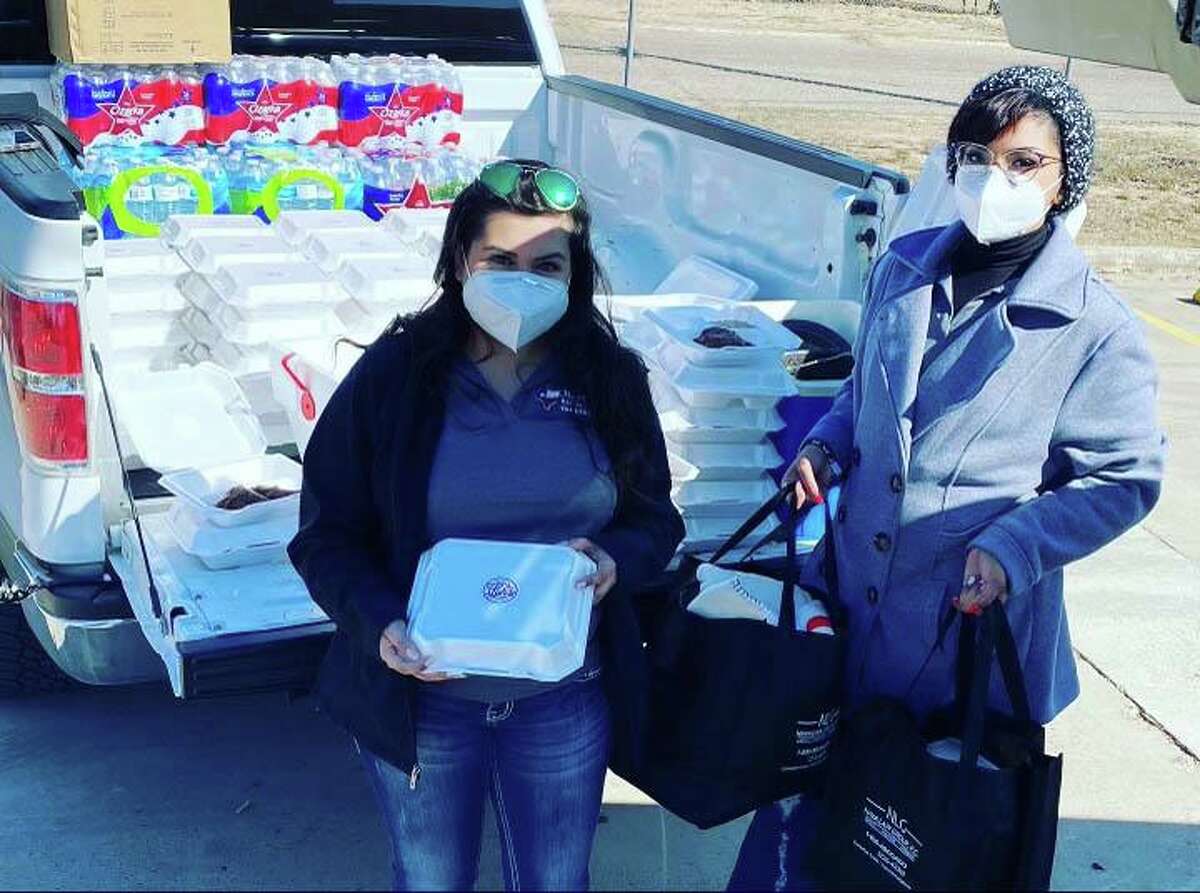 Donations of blankets and meals were provided on Friday by employees and volunteers of the Texans Recovering Together program at the Rio Bravo Community Center