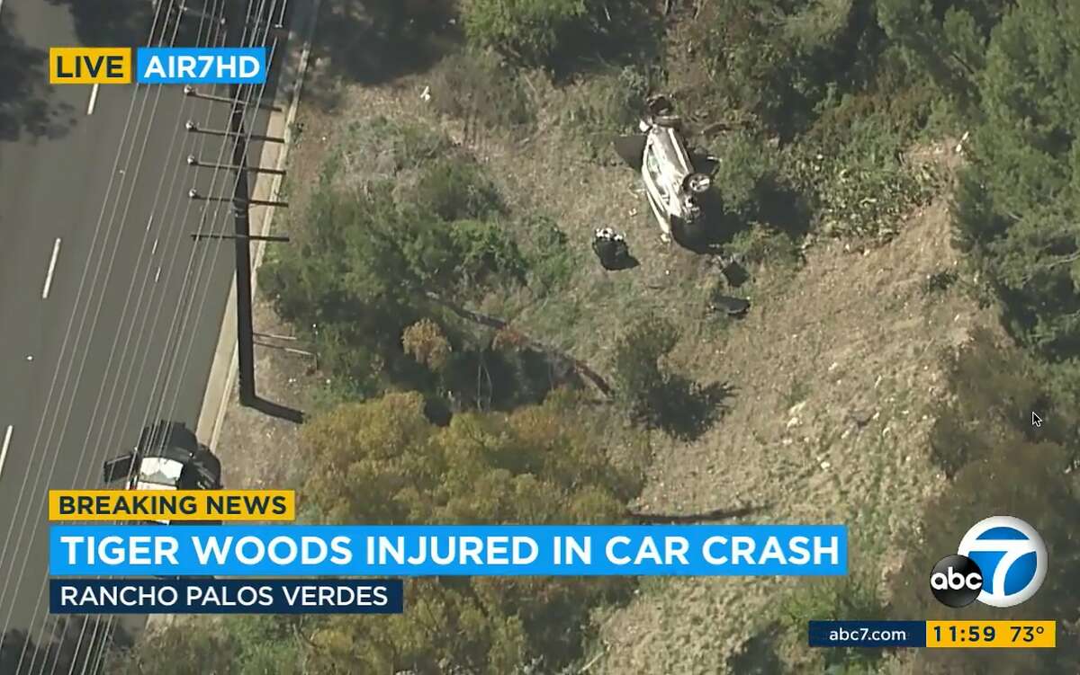 In this aerial image take from video provided by KABC-TV video, a vehicle rest on its side after a rollover accident involving golfer Tiger Woods along a road in the Rancho Palos Verdes section of Los Angeles on Tuesday, Feb. 23, 2021. Woods had to be extricated from the vehicle with the