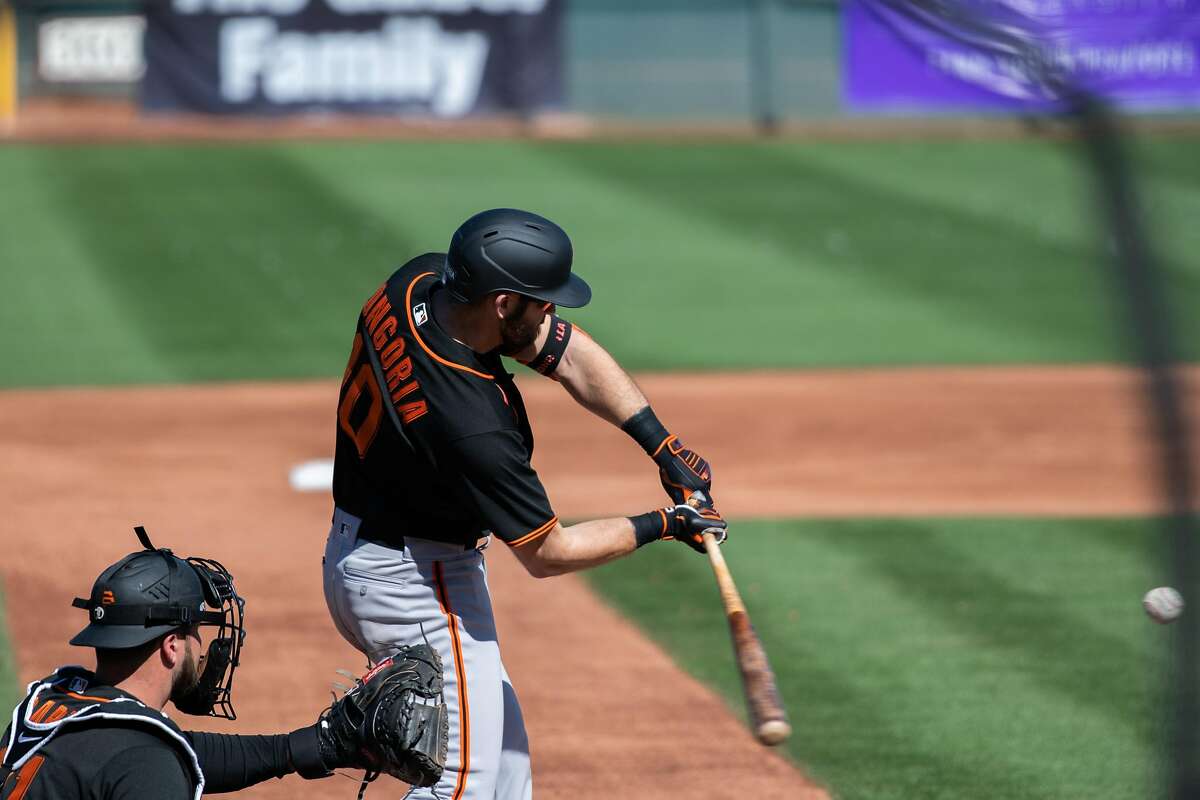 Evan Longoria practices before opening day of Spring Training in the Cactus League at Scottsdale Stadium on Tuesday, Feb. 23, 2021, in Scottsdale, Ariz.