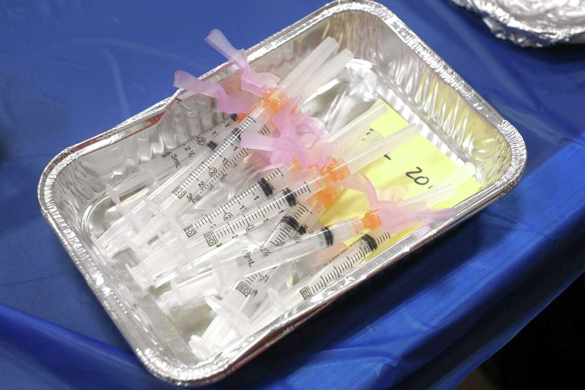 A tray of syringes filled with doses of COVID-19 vaccine at the vaccination clinic set up in the gymnasium of the Bigelow Center for Senior Activities, in Fairfield in Jan.
