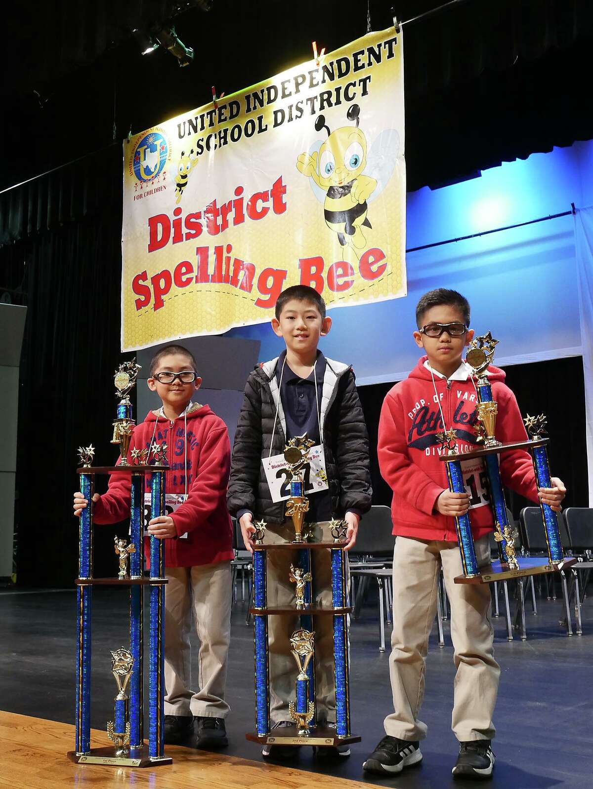Lamar Bruni Vergara Middle School 6th grade student Emmanuel Rimocal holds the first place trophy he won at the United ISD District Spelling Bee, Thursday, January 31, 2019 at the UISD Student Activity Complex Auditorium. This is Rimocal's second victory at the district level. He was competing against his younger brother Nathaniel, a 4th grade student at Kennedy-Zapata Elementary, who finished in third place.
