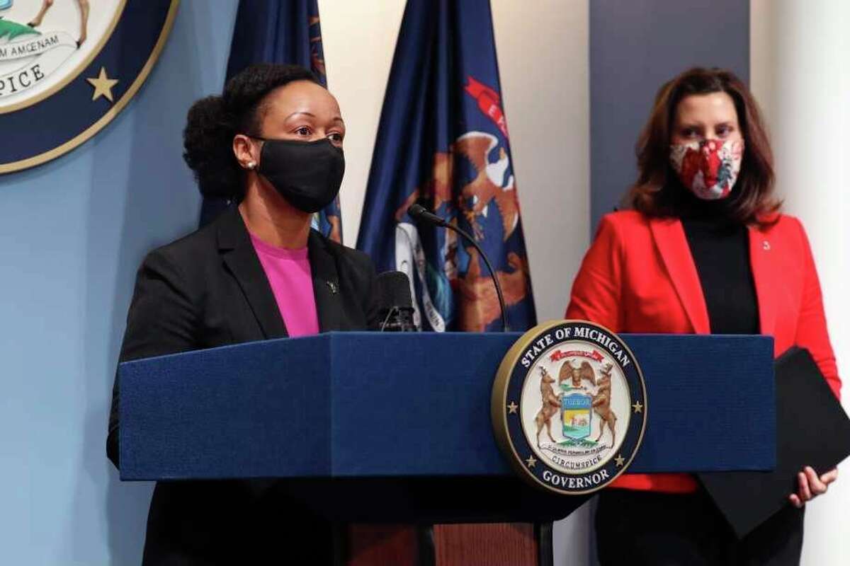 In this Feb. 17, 2021 file photo, Dr. Joneigh Khaldun (left), the state's chief medical executive, addresses the state during a speech. (Michigan Office of the Governor via AP, file)