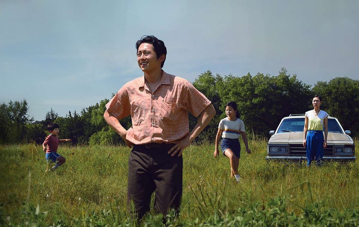 Alan S. Kim, left, Steven Yeun, Noel Cho and Yeri Han in A24's "Minari." (David Bornfriend/A24/TNS)