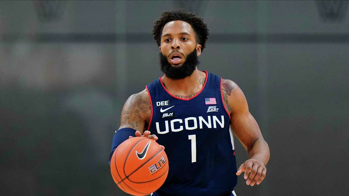 R.J. Cole is UConn's second-leading scorer after a 17-point effort on Tuesday at Georgetown (AP Photo/Matt Slocum)