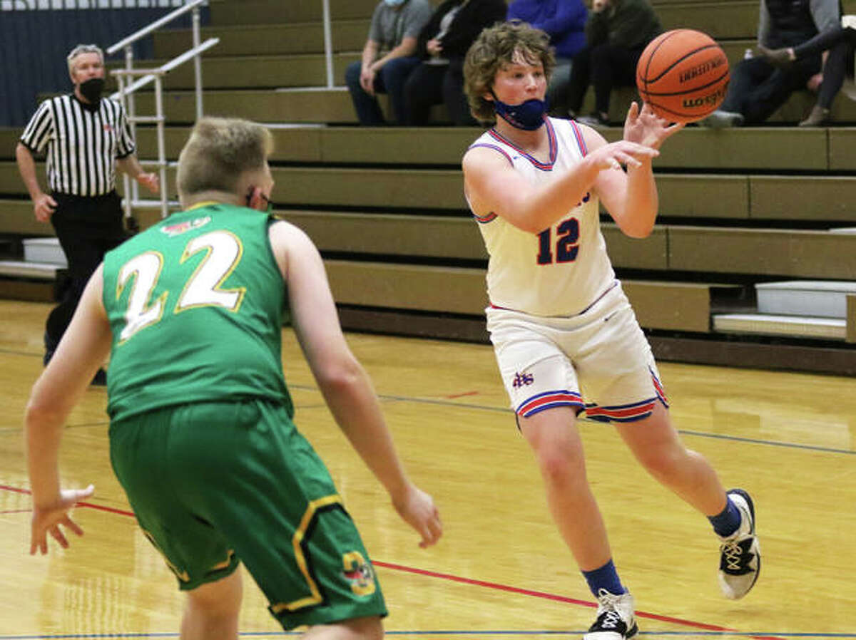 Carlinville’s Ryenn Hart (12) scored 26 points in his team's 50-42 SCC victory over Southwestern Monday night in Piasa. Hart is shown in action in an earlier game against Southwestern.