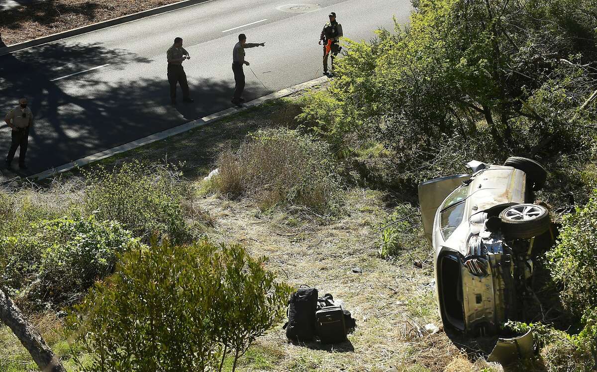 L.A. County Sheriffs deputies investigate an accident involving golfer Tiger Woods along Hawthorne Boulevard in Rancho Palos Verdes, Calif., Tuesday, Feb. 23, 2021. (Wally Skalij/Los Angeles Times/TNS) L.A. County Sheriffs deputies investigate an accident involving golfer Tiger Woods along Hawthorne Boulevard in Rancho Palos Verdes, Calif., Tuesday, Feb. 23, 2021. (Wally Skalij/Los Angeles Times/TNS)