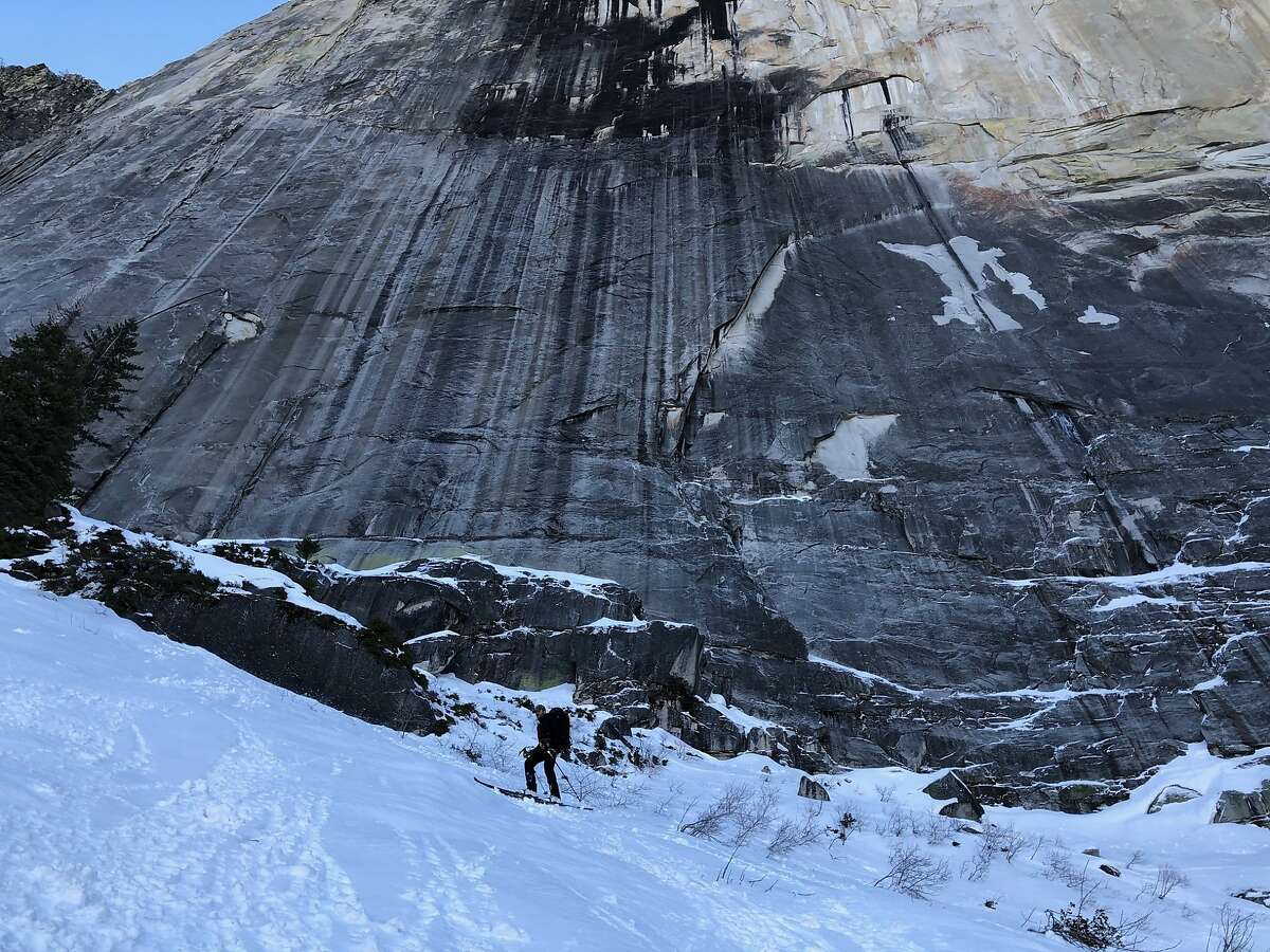 Zach Milligan pauses during a ski descent of Half Dome in Yosemite