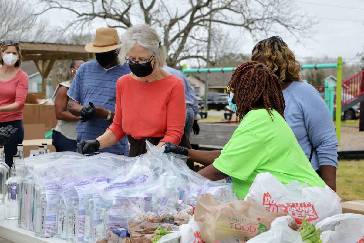 Volunteers distribute personal protection equipment, groceries and meals to Richmond residents.