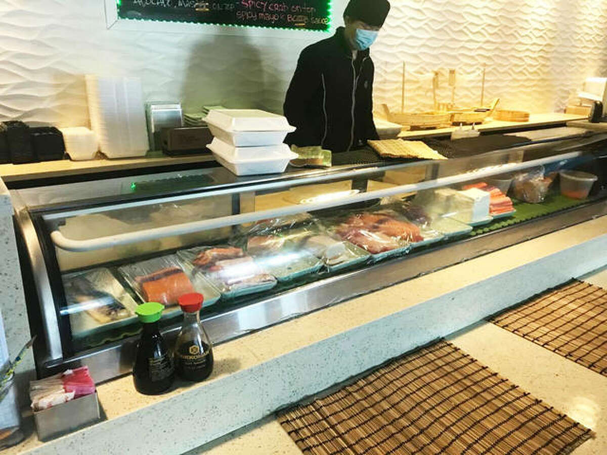 A to-go order of sushi rolls awaits on top of the sushi bar at Shogun Japanese Steakhouse, at 2723 Corner Court, just off Homer Adams Parkway, in Alton.