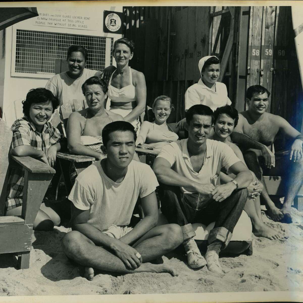 Betty Winstedt at the Waikiki Surf Club with friends in 1956.