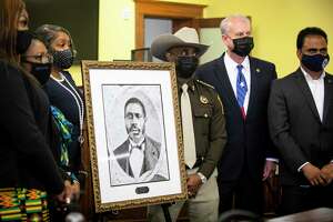 Fort Bend County officials unveil portrait in honor of Walter Moses Burton, first black sheriff