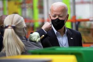 Biden visits Houston to offer comfort after winter storm, tout vaccination efforts