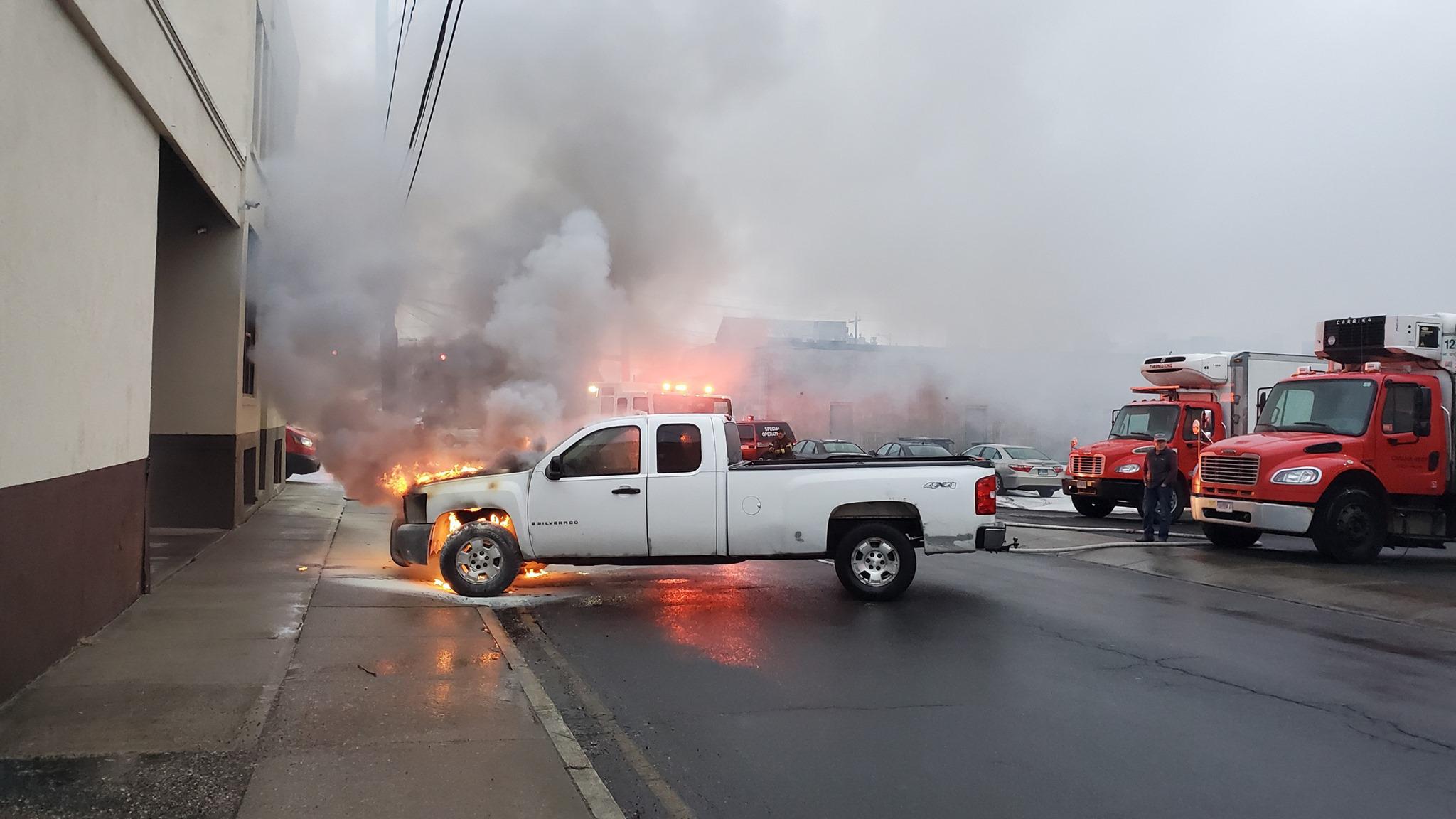 Quickthinking fire chief pulls burning truck from Danbury building