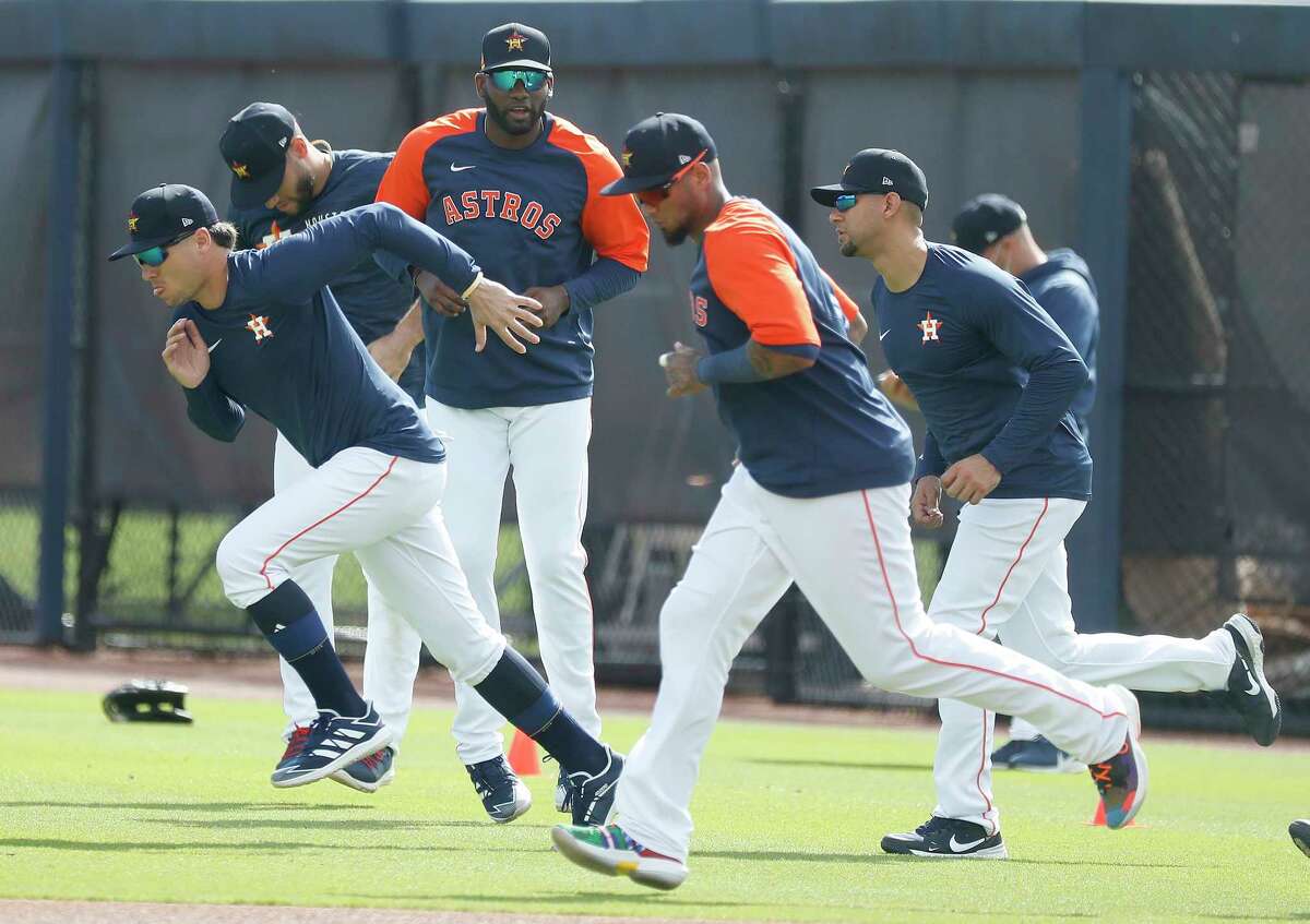 Houston Astros Yordan Alvarez warms up with teammates during spring training workouts for the Astros at Ballpark of the Palm Beaches in West Palm Beach, Florida, Saturday, February 27, 2021.