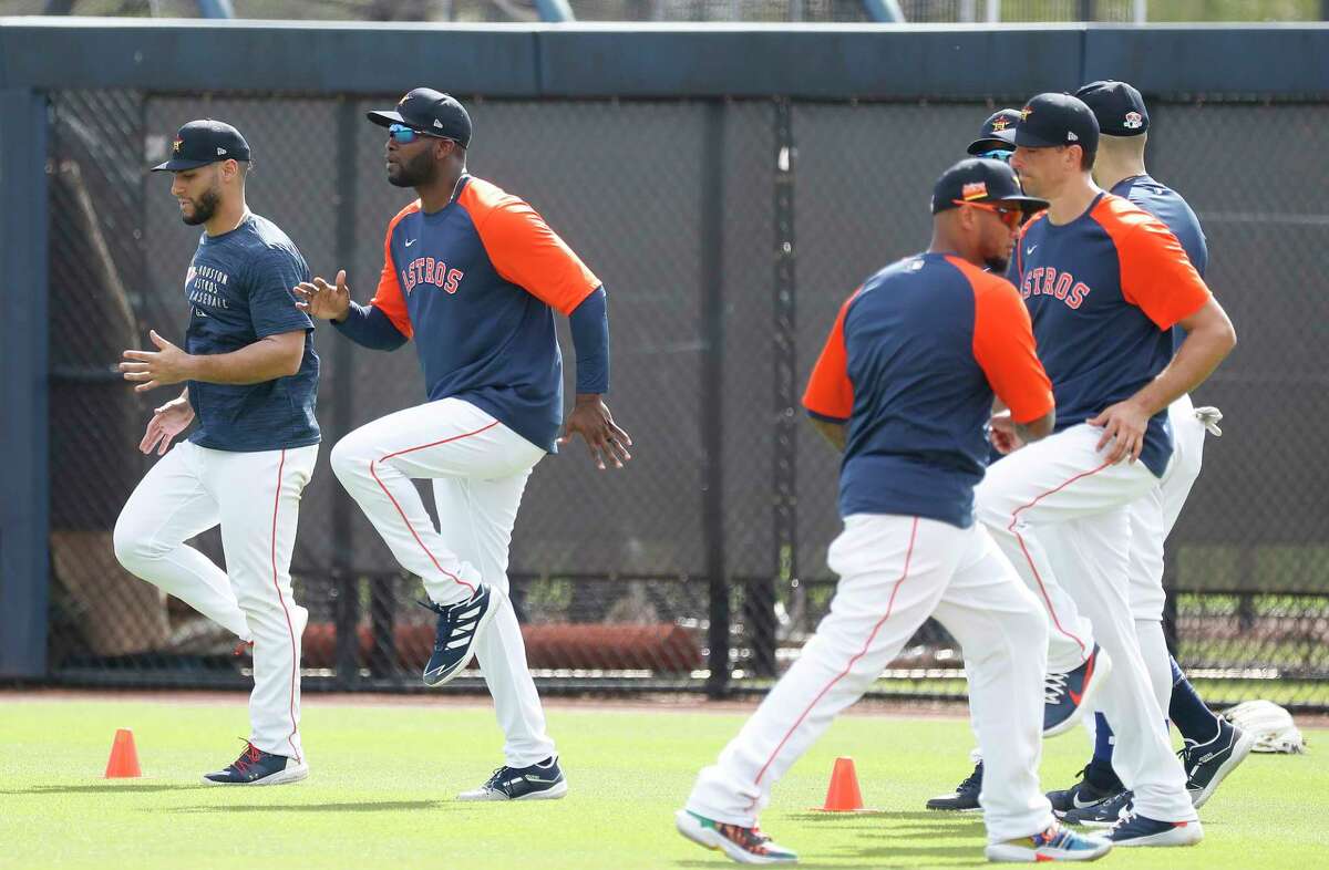 Houston Astros Yordan Alvarez warms up with teammates during spring training workouts for the Astros at Ballpark of the Palm Beaches in West Palm Beach, Florida, Saturday, February 27, 2021.