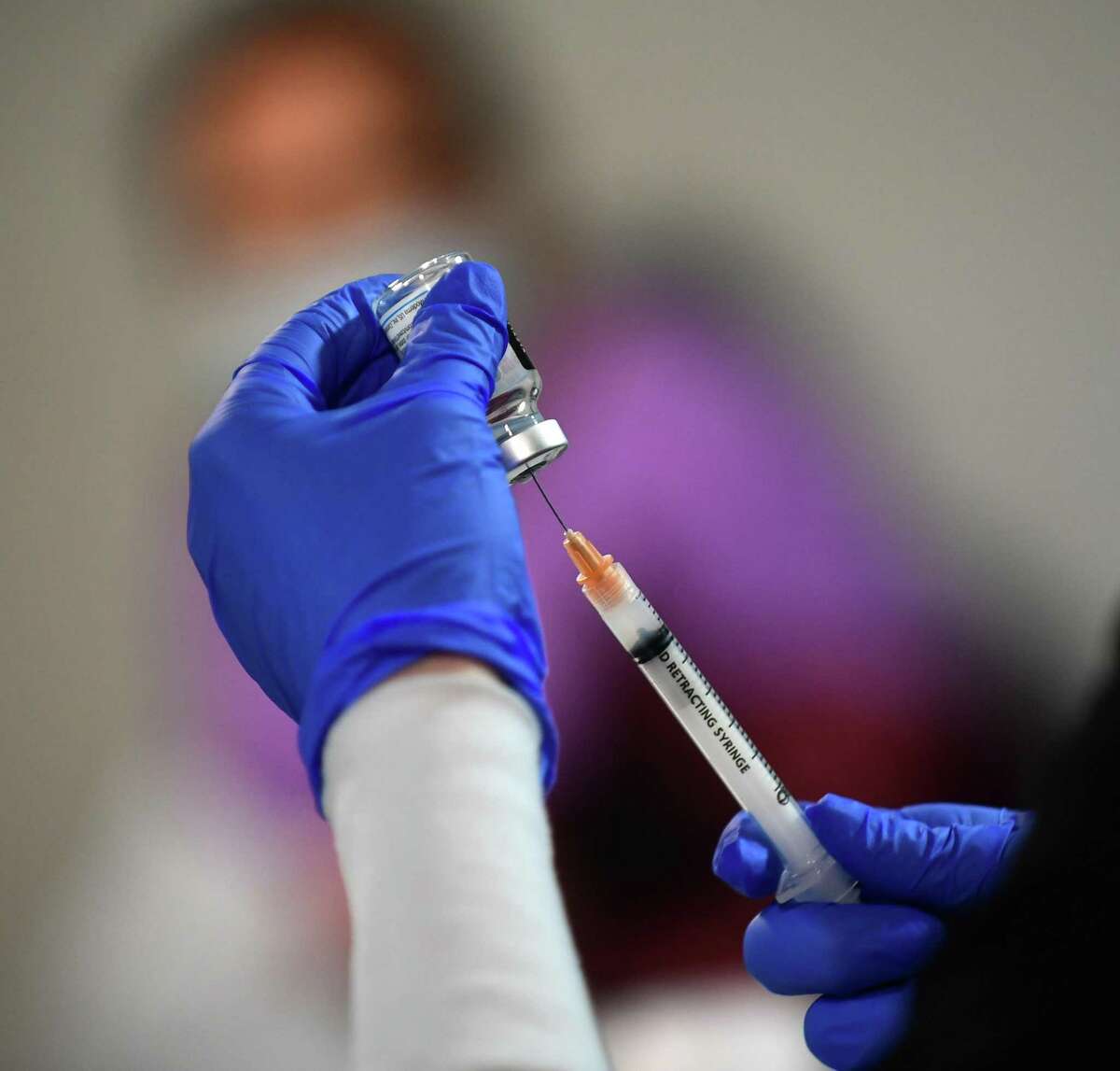 Stamford residents receive their shot during a pop-up clinic for COVID-19 vaccination Saturday, February 27, 2021 for first and second doses at the Bethel AME Church in Stamford, Conn. This clinic is set up to support vaccination within communities of color and for those who do not have the ability to make appointments online. The clinic will be held again on March 27 (10am-3pm).