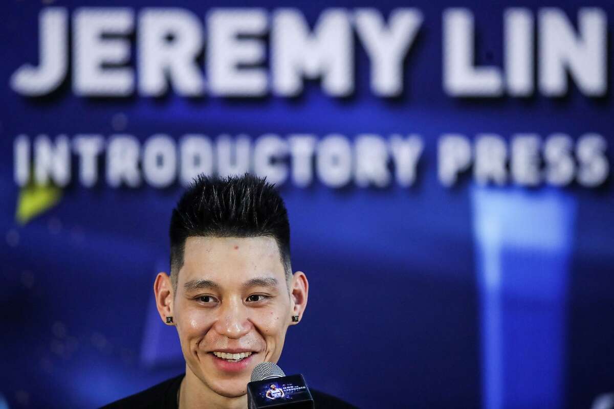 (FILES) In this file photo taken on September 26, 2019, former NBA player Jeremy Lin of the US speaks during an introductory press conference held by his new team Beijing Shougang in Beijing. - Lin said on February 27, 2021, he won't be "naming or shaming anyone" amid reports the NBA's G League is investigating his claim he was called "coronavirus" during a game. (Photo by STR / AFP) / China OUT (Photo by STR/AFP via Getty Images)
