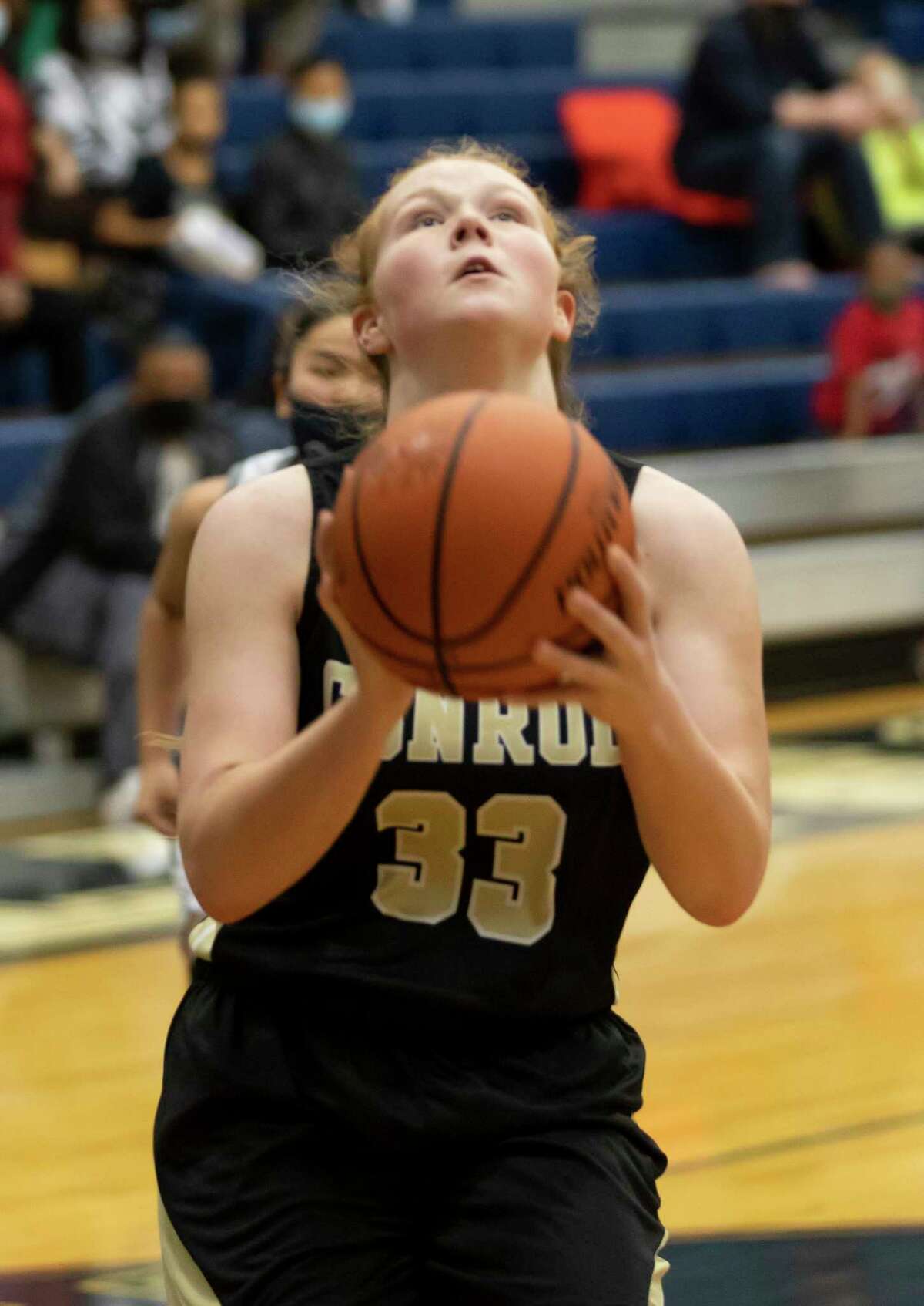 Conroe Makenzie Castille (33) shoots for the basket during the third quarter of a District 13-6A girls basketball game against College Park at College Park High School, Saturday, Jan. 16, 2021, in The Woodlands.