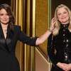 This handout screen grab courtesy of NBCUniversal shows hosts, Tina Fey (L) and Amy Poehler (R) during the 78th Annual Golden Globe Awards ceremony simultaneously in Beverly Hills, California and in New York on February 28, 2021. - Usually a star-packed, laid-back party that draws Tinseltown's biggest names to a Beverly Hills hotel ballroom, this pandemic edition will be broadcast from two scaled-down venues, with frontline and essential workers among the few in attendance. (Photo by - / NBCUniversal / AFP) / RESTRICTED TO EDITORIAL USE - MANDATORY CREDIT "AFP PHOTO /NBCUniversal" - NO MARKETING NO ADVERTISING CAMPAIGNS - DISTRIBUTED AS A SERVICE TO CLIENTS --- NO ARCHIVE --- / **FOR EDITORIAL USE ONLY AND CANNOT BE ALTERED, ARCHIVED OR RESOLD. SPECIFIC CLEARANCE REQUIRED FOR COMMERCIAL OR PROMOTIONAL USE. CONTACT YOUR NBCU REPRESENTATIVE FOR FURTHER INFORMATION** (Photo by -/NBCUniversal/AFP via Getty Images)