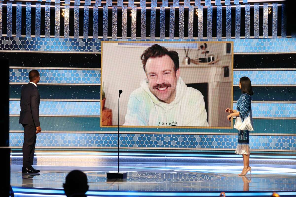 Jason Sudeikis accepts the Golden Globe for best actor in a TV musical or comedy for