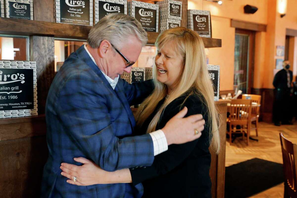 Kidney transplant recipient Donna Hawkins, right, hugs Chris Tritico, left, father of the kidney donor, as they see each other for the first time since Donna’s kidney transplant as they meet for lunch at Ciro’s Restaurant Friday, Feb. 26, 2021 in Houston, TX. Tritico's daughter was killed in the crossfires of a random gang-related shooting in Florida last year. Hawkins is a former prosecutor for the Harris County DA's Office, and Tritico is a defense attorney in the Houston Bar. They're family friends.