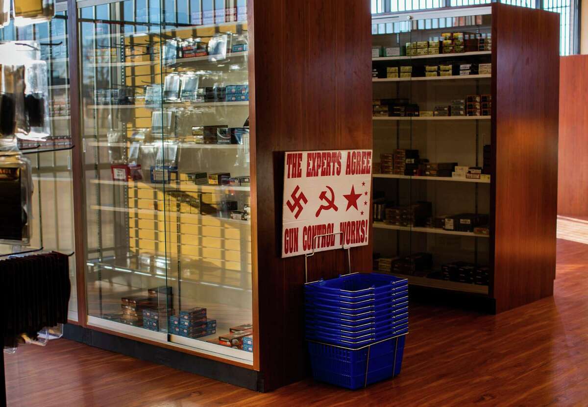 Shelves with stored bullets for sale at Collectors Firearms, Friday, Jan. 29, 2021, in Houston.