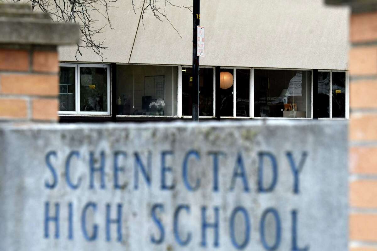 A few lights are visible in Schenectady High School as middle and high school students prepare for a Wednesday return to classrooms in the Schenectady School District on Monday, March 1, 2021, in Schenectady, N.Y. (Will Waldron/Times Union)