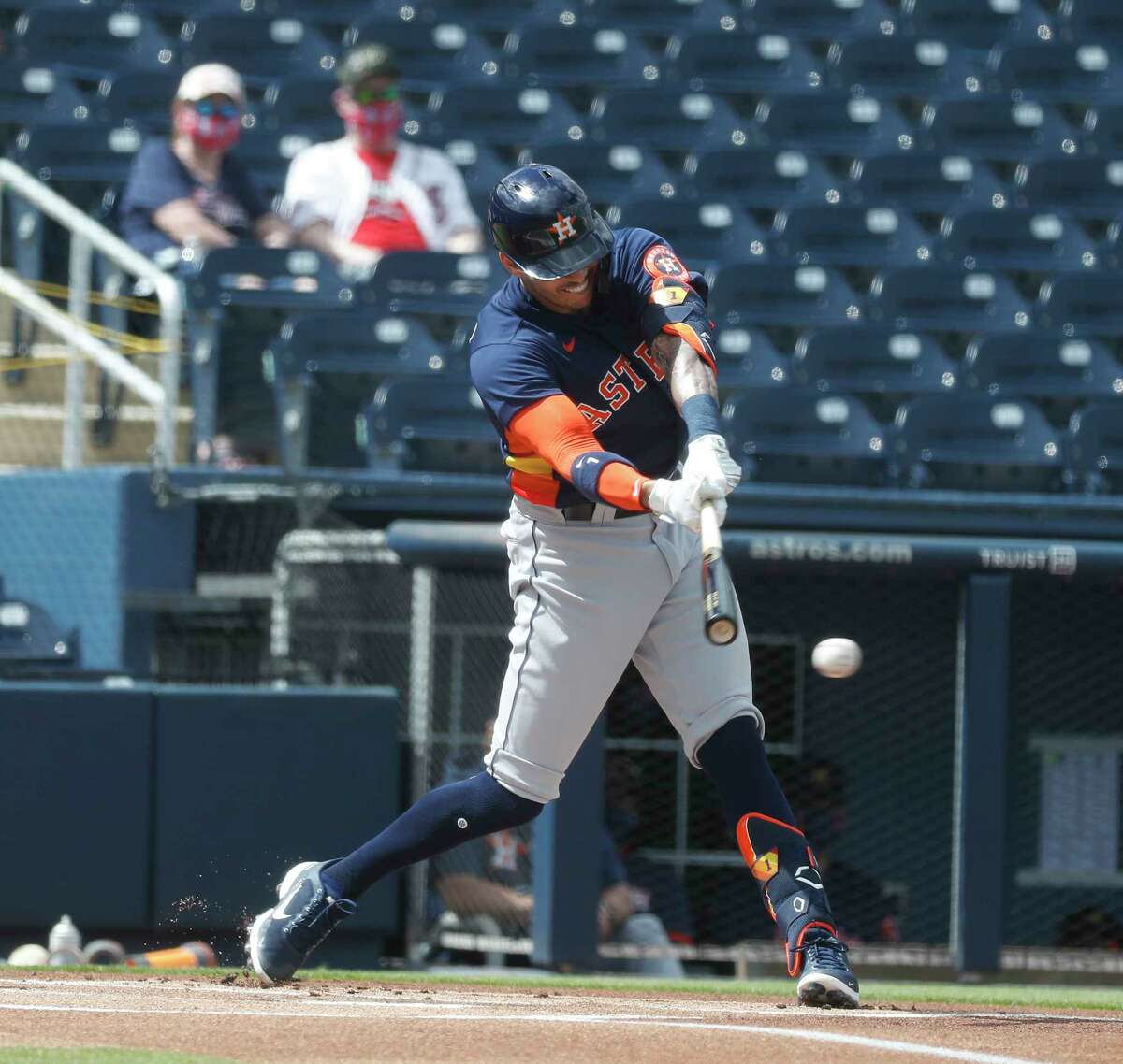 Houston Astros Carlos Correa (1) hits into a ground out during the first inning of an MLB spring training game at Ballpark of the Palm Beaches in West Palm Beach, Florida, Monday, March 1, 2021.