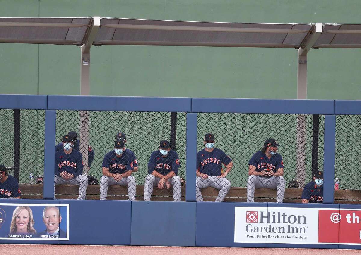 Houston Astros pitchers in the bullpen during the first inning of an MLB spring training game at Ballpark of the Palm Beaches in West Palm Beach, Florida, Monday, March 1, 2021.