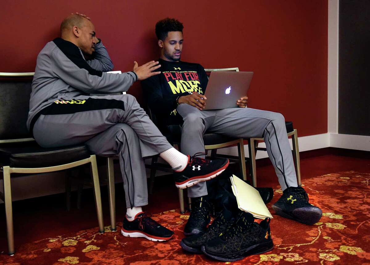 Former Siena assistant Cliff Warren, left, shown here as a Maryland assistant and talking with Melo Trimble, could be a candidate for the vacant UAlbany head-coaching position. (Toni L. Sandys/Washington Post)
