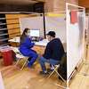 Westport's John Backus, 91, prepares to receive the COVID-19 vaccine from Elaine Jara during the Greenwich Hospital COVID-19 vaccine clinic at the Brunswick Lower School Campus in Greenwich, on Jan. 25.
