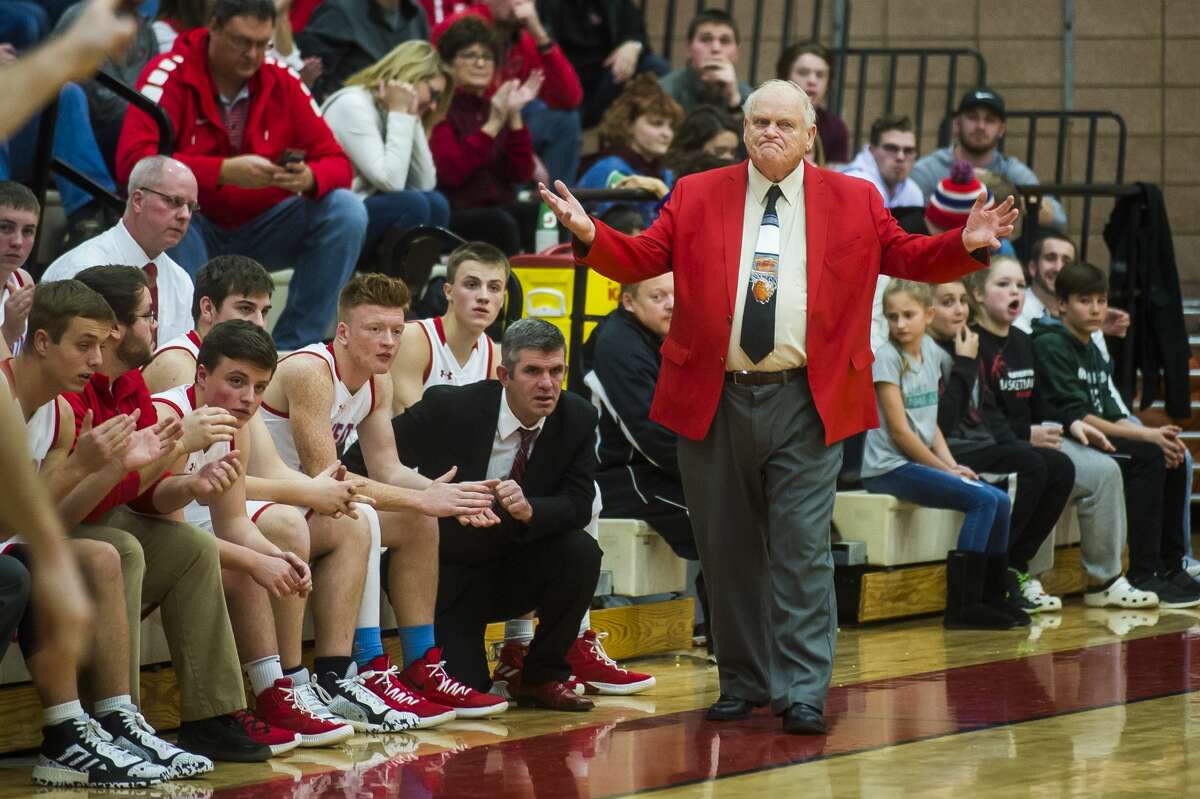 Beaverton coach Roy Johnston stalks the sideline during a Dec. 17, 2019 game against Meridian. Johnston earned his 800th career win as the Beavers' boys' basketball coach with a victory over Pinconning on Wednesday.