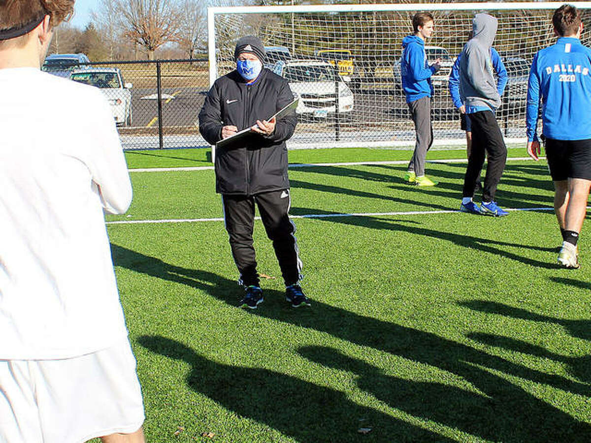New Marquette Catholic high boys soccer coach Jerry DiSalvo organizes his team’s first official preseason practice Monday at Gordon Moore Park. DiSalvo replaces Tim Gould, who left to become athletic director at Decatur MacArthur High School.