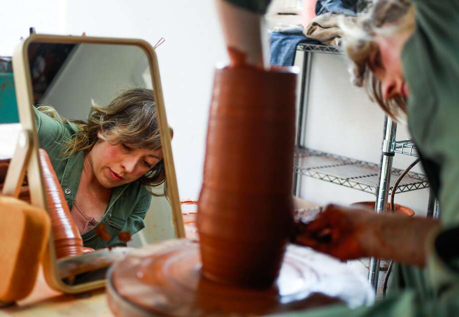 Erin Hupp of Erin Hupp Ceramics makes a vase in her East Bay studio. Photo: Gabrielle Lurie / The Chronicle