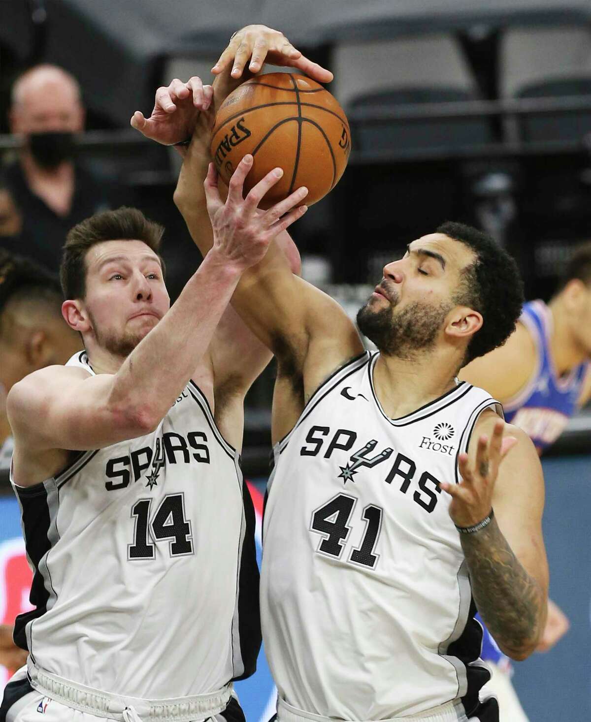 Spurs' Drew Eubanks (14) and Trey Lyles (41) both go up for a rebound against the New York Knicks at the AT&T Center on Tuesday, Mar. 2, 2021. Spurs defeated the Knicks, 119-93.