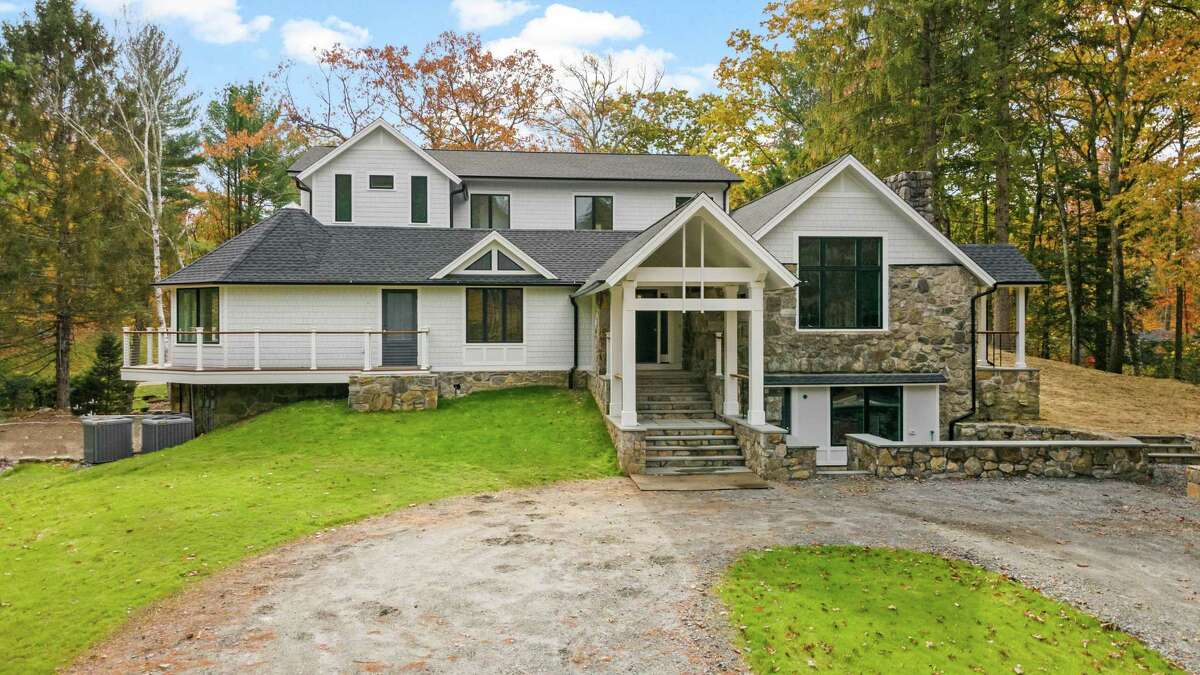 Newly constructed contemporary farmhouse at 58 Weston Woods Way, Weston.