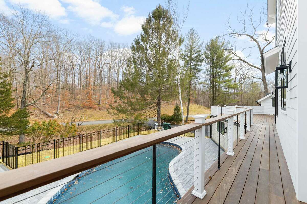 IPE deck looking over Gunite swimming pool at 58 Weston Woods Way, Weston.